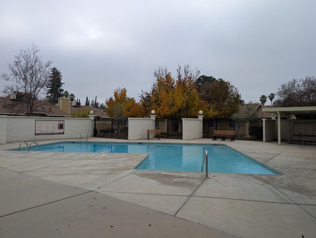 Building Photo - Completely remodeled and updated condo close to Fresno State and shopping. *Ask about the Move-in...