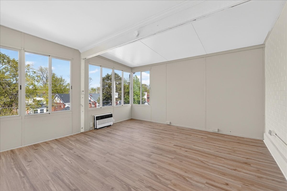 Light-filled sunroom bedroom offering a unique and relaxing retreat - 5185 Goethe Ave