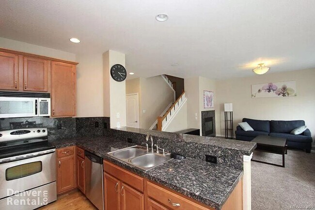 Building Photo - Beautiful Greenwood Village Three Bedroom Home in Gated Community