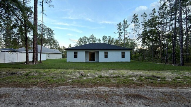 Building Photo - 7250 N Freeport Cir