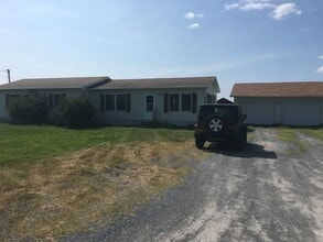 Building Photo - Cozy 3 bedroom 1.5 bath with 2 stall detached garage in country setting