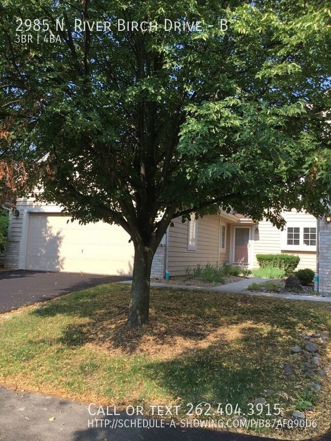 Building Photo - Huge condo with 2 car garage!