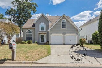 Building Photo - "Charming 4-Bedroom Retreat with Fireplace & Hardwood Floors on Michelle Drive!"