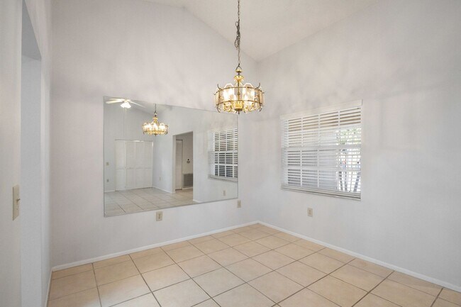 Building Photo - Beautiful Must See!! 3/2 Plus Sunroom & Garage!!  Gated Community!!