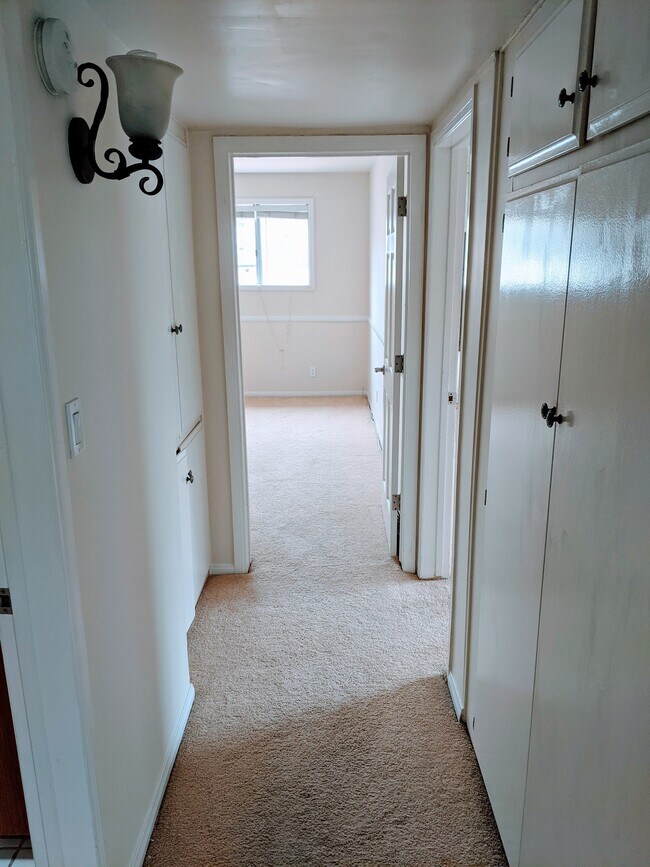 Hallway with Cabinets - 10445 Eastborne Ave