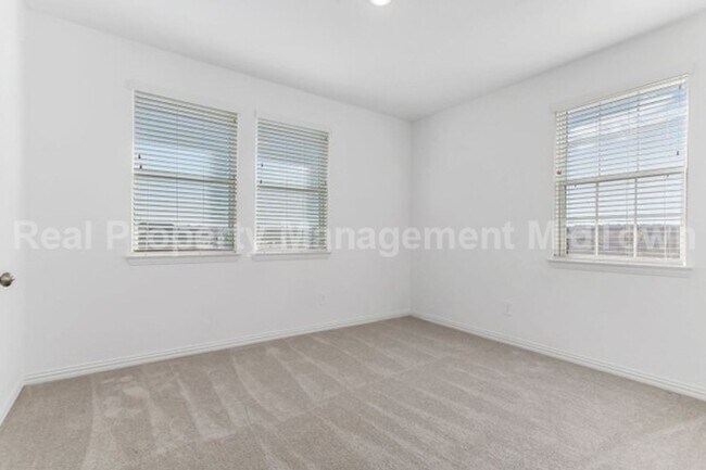 Building Photo - Live Elevated in the Heart of Viridian – S...
