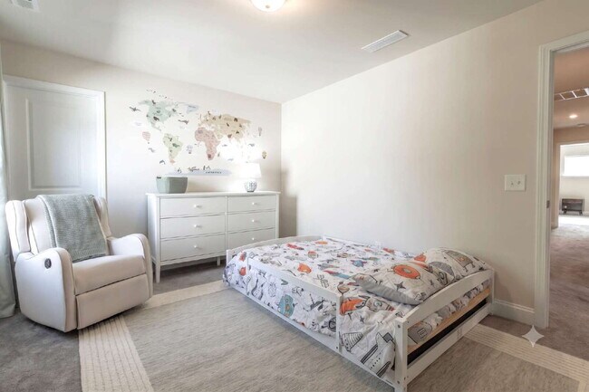 Building Photo - "Discover Spacious Living: 5-Bedroom Craftsman Home in Gated and Amenity-Rich Bretagne with Top-R...