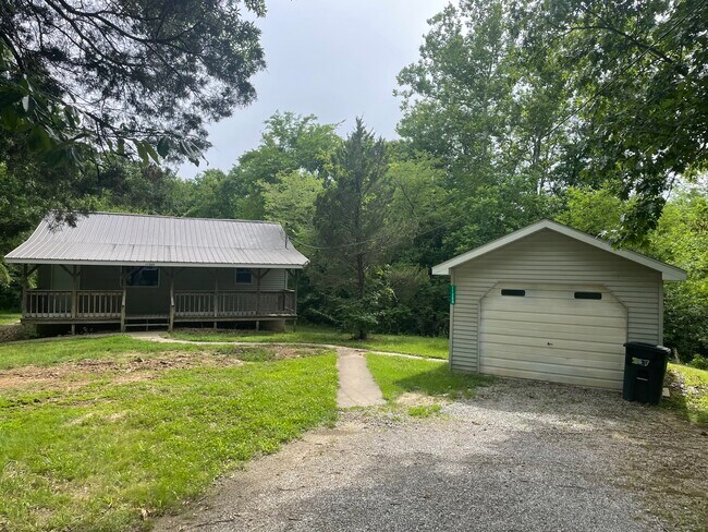 House and detached garage - 11369 McFarland Ln