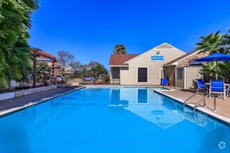 MAKE WAVES AT THE REFRESHING  SWIMMING POOL - Wood Trails Apartments