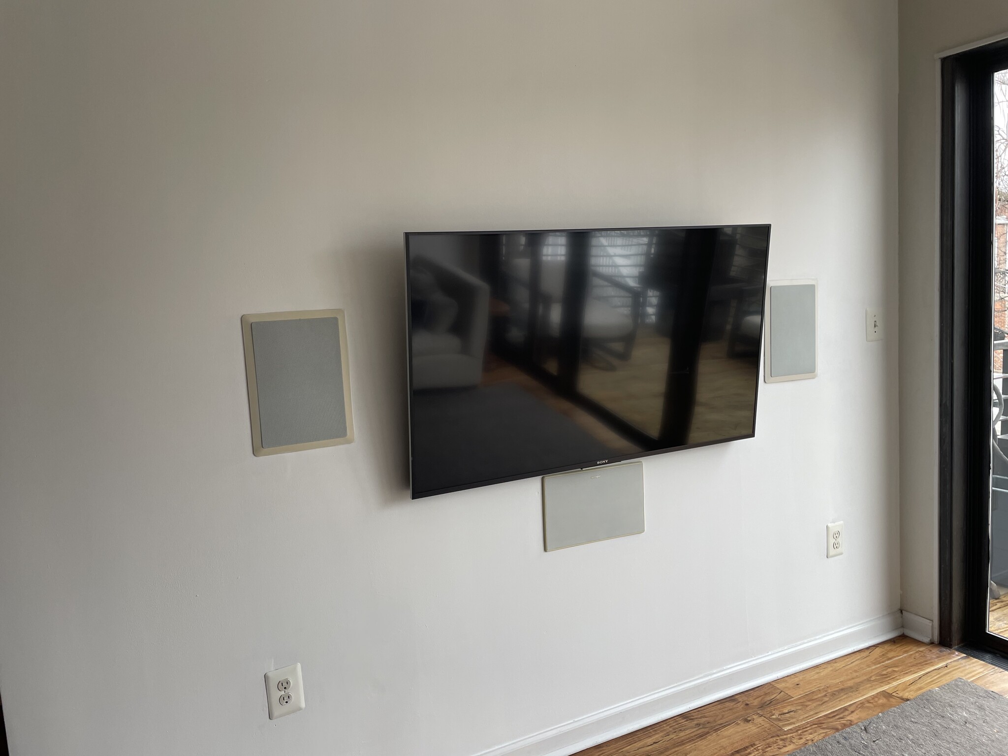 Smart TV with speakers inset - 1003 P St NW