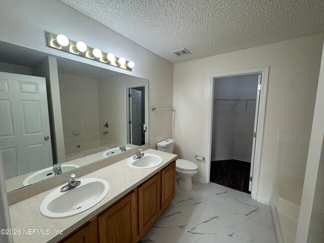Building Photo - 7557 Cliff Cottage Dr