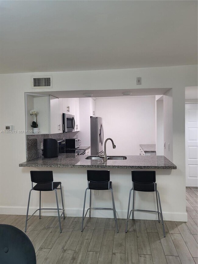 Building Photo - 4555 NW 99th Ave