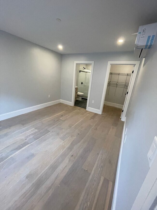 Building Photo - New Modern Elevator Building with Garage P...