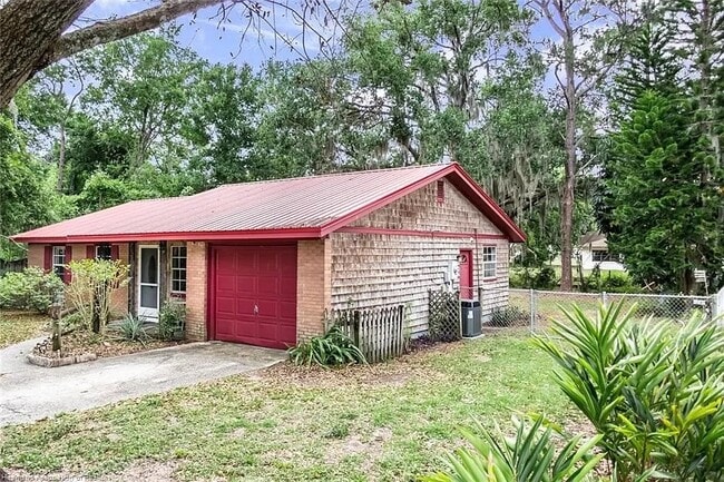 garage and side yard - 1606 Churchill St