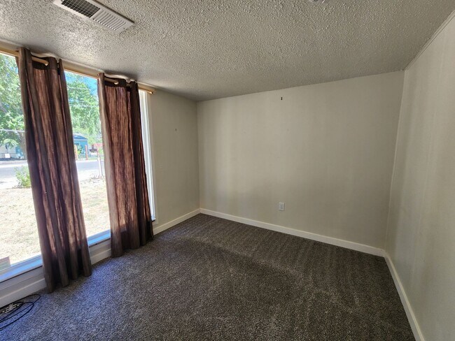 Building Photo - Affordable House! Large Dog OK! FREE 1 month hold option!