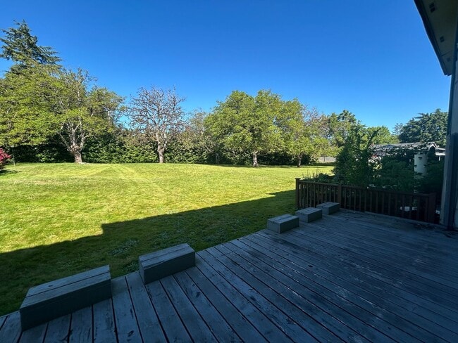 Building Photo - NW Vancouver Condo with Detached Garage & Dedicated Parking