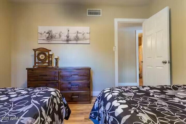 Building Photo - 8447 E Sheridan St