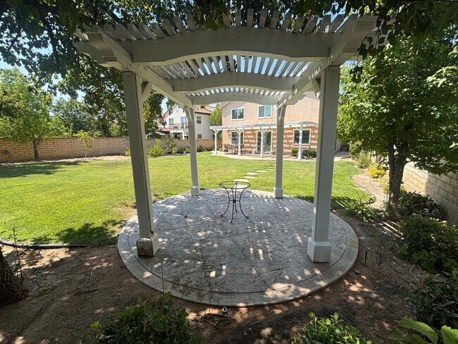 Building Photo - Spacious 4-Bedroom Home with Community Ame...
