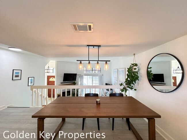 Building Photo - Welcome to this stunning ***unfurnished*** tri-level condo in the desirable Casitas de la Costa c...