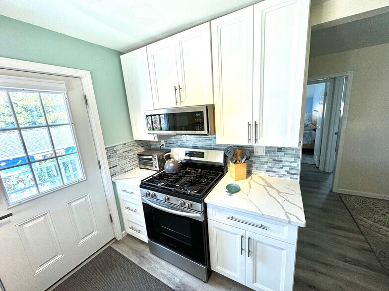New stainless steel appliances - 213 Amber St