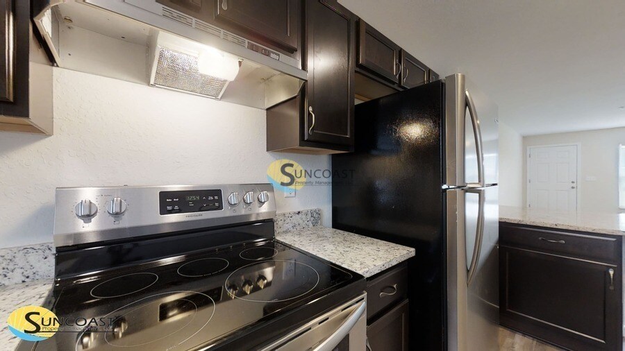 Building Photo - 9106 N Travis Dr
