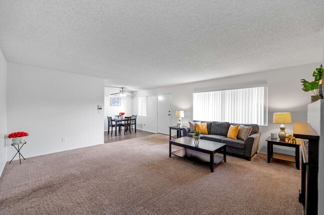 Spacious living room with ample natural light at the Diplomat Apartment in Studio City - The Diplomat