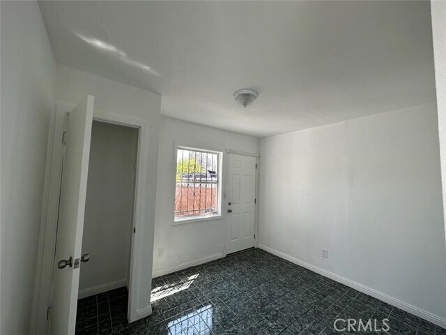 Building Photo - 9320 Normandie Ave