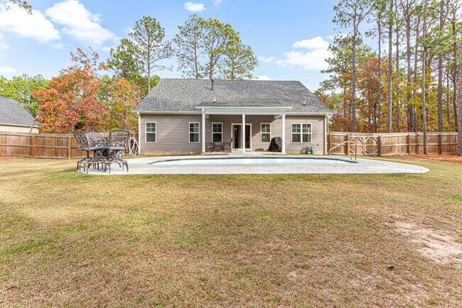 Building Photo - Southern Pines Gem! Pool and fenced backyard!