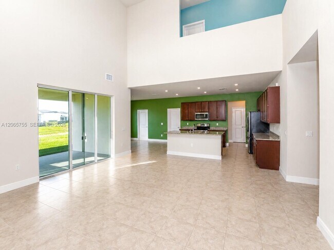 Building Photo - 10976 SW Tessili Wy