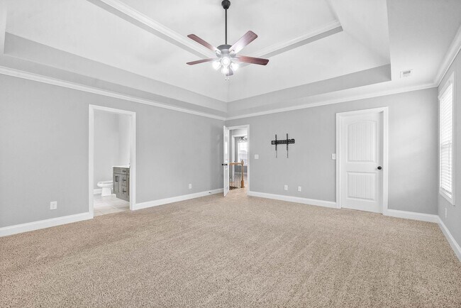 Building Photo - Pet Friendly Three Bedroom with Bonus!