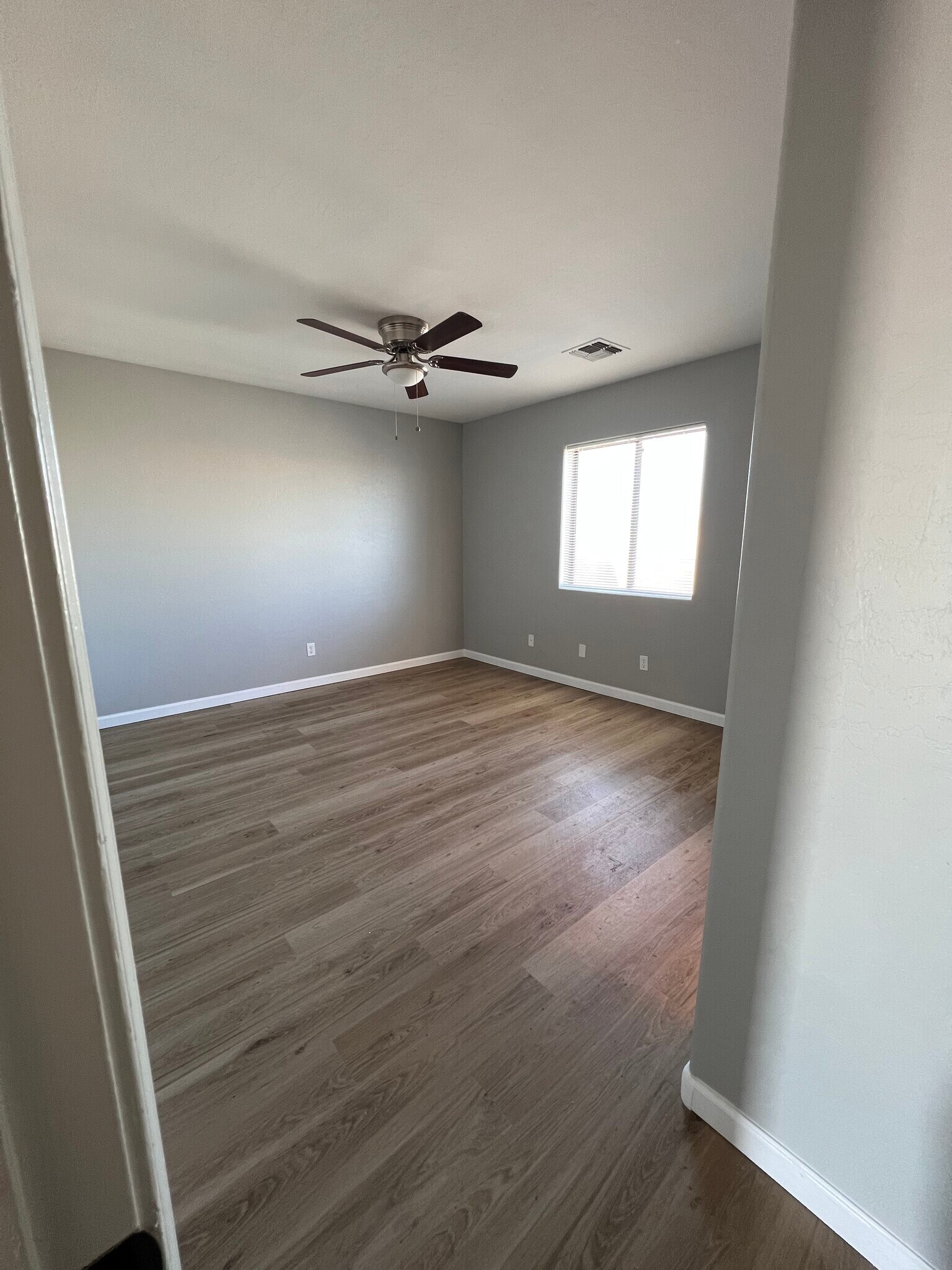 Master bedroom, No Carpet, Ceiling Fan and Smart light switches - 8268 W Magnum Dr