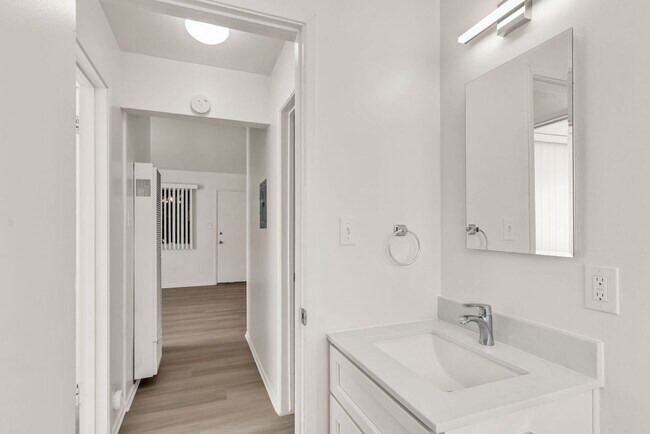 Building Photo - This is a large 2-bdr in a convenient, Freshly painted, updated kitchen counter tops and cabinets