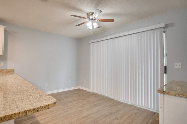 Building Photo - Modern 3BR/2BA Duplex with Granite Countertops, Stainless Appliances, Covered Patio & Private Fen...