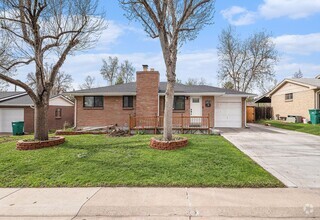 Building Photo - Updated Five-Bedroom Brick Ranch in the He...
