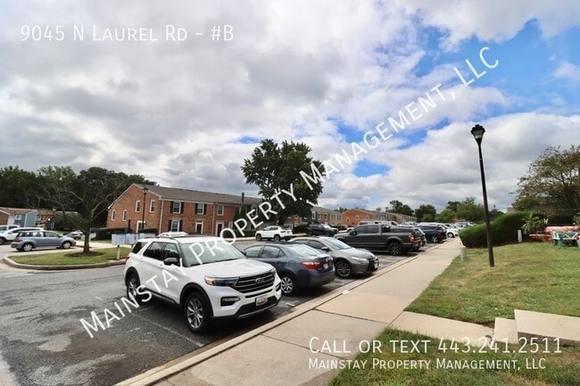 Building Photo - 9045 N Laurel Rd