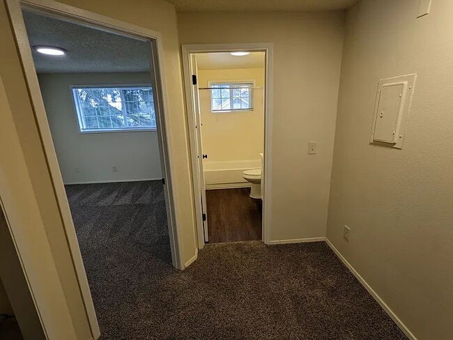 Building Photo - Available Now! Pet-Friendly 2 Bed/ 1.5 Bath with Patio & Parking