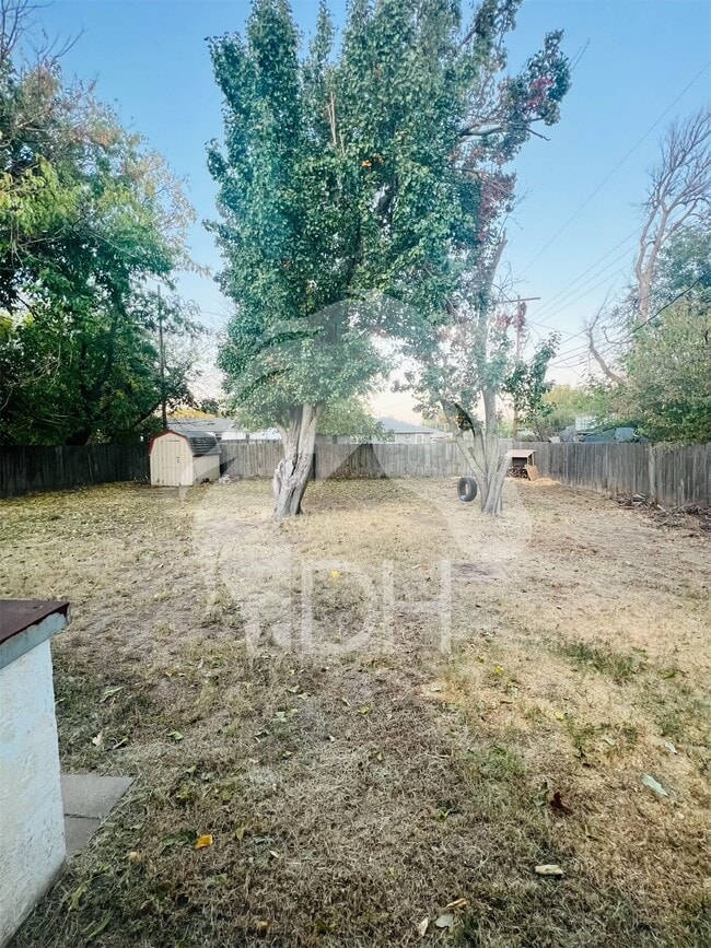 Building Photo - "Charming 4-Bedroom Home with Beautiful Hardwood Floors on South Harding Street!"