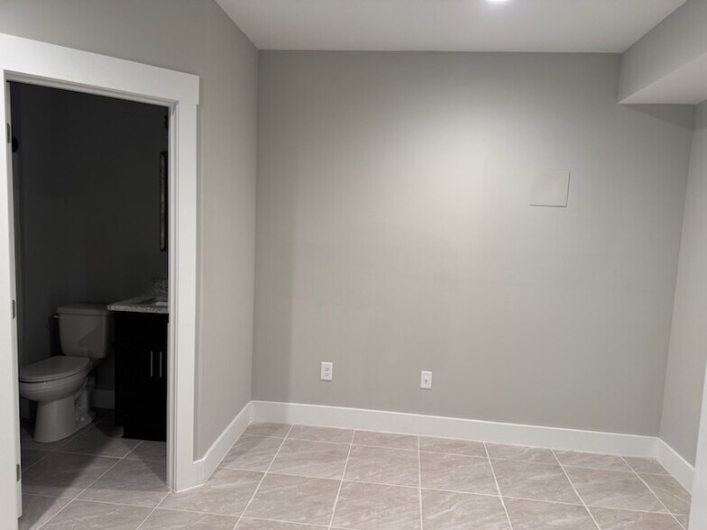 Downstairs spacious office/den with full bathroom - 100 Storytown Vlg