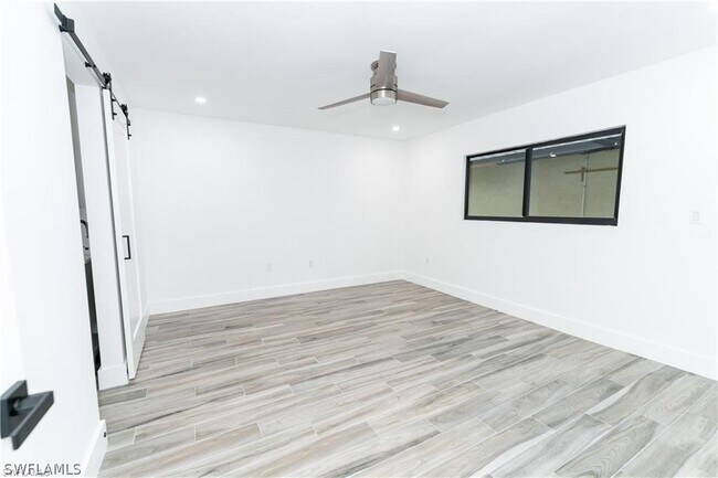 Building Photo - 6499 Royal Woods Dr