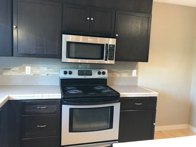 Building Photo - 2x2 with Loft! Walk to Harney Elementary! ...