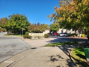 Building Photo - A Must See! Nice and bright, lots of light, two story condo in a well maintained complex.