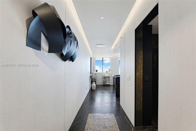 Building Photo - 5875 Collins Ave