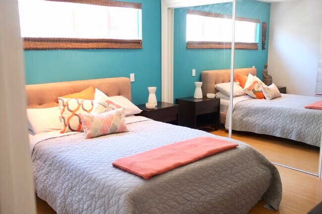 Bright and roomy bedroom with mirror closet doors - 2431 3rd St