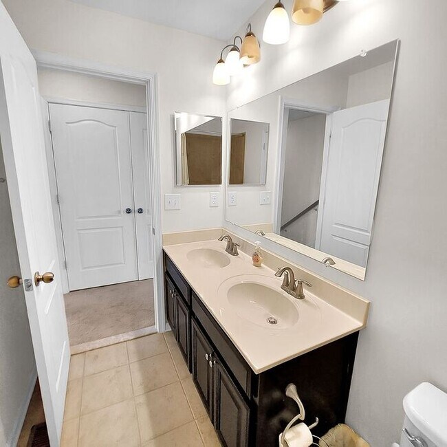 Building Photo - Stately End Unit 3-Level Townhome, 3 Bedro...