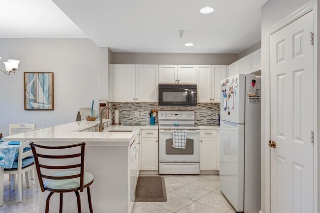 Building Photo - ** BOTANICAL PLACE ** 3 BED / 2 BATH - CONDO - TURNKEY FURNISHED - SEASONAL OR SHORT TERM