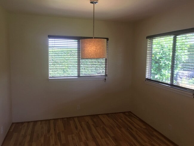 Building Photo - Available now: A 3 bedroom, 2 bath home features open concept floor plan for entertaining and a 2...