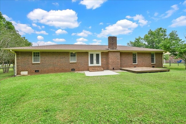 Building Photo - Beautiful 4 Br Brick home