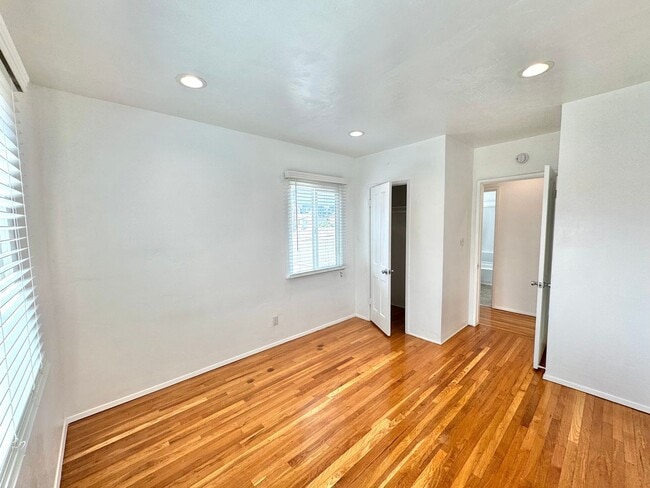Building Photo - An apartment with character! Hardwood floo...