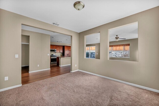 Building Photo - Sun-Filled, Spacious Living with a Three-Car Garage