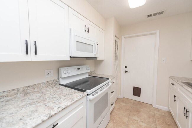 Building Photo - Indian Harbor Beach Stunner! Corner Lot Cl...